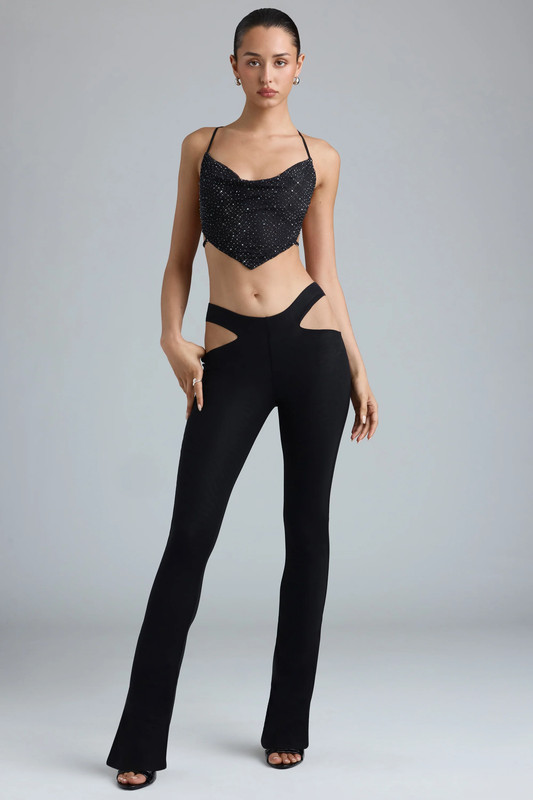 Petite Metallic Cut-Out Low-Rise Flared Trousers in Black - UK Size:6